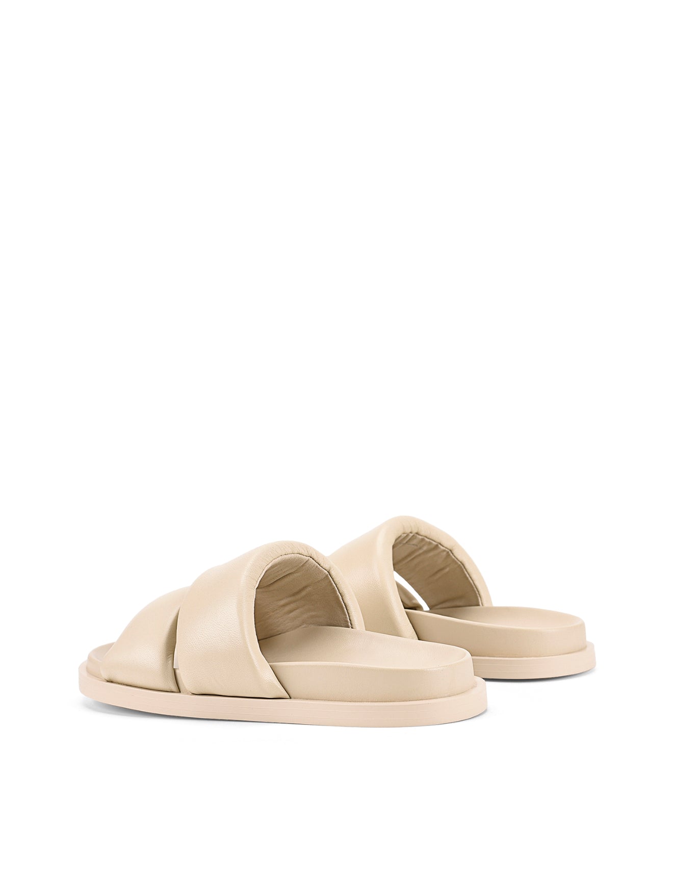 Women's beige leather footbed slide with puffy vamp upper